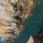 Two diving into water