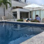 Drinks on roof by swimming pool