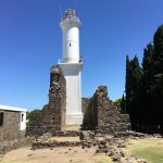 The lighthouse, with the remains of the convent in front