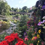 Hotel with chain bridge in distance