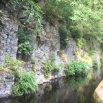 Narrow canal cut out of the rock.